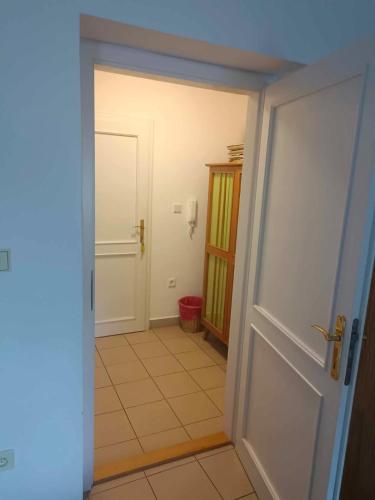 an open door to a room with a hallway at Ubytování ve Mlýně in Kladenské Rovné