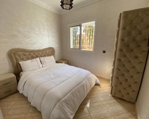 Postel nebo postele na pokoji v ubytování Villa avec piscine à Agadir tifnit surf