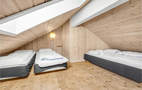 Katil atau katil-katil dalam bilik di Amazing Home In Idestrup With Sauna