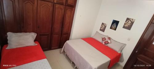 Postel nebo postele na pokoji v ubytování Villa sonhos