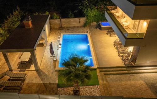 an overhead view of a swimming pool in a house at Villa Gina in Sukošan