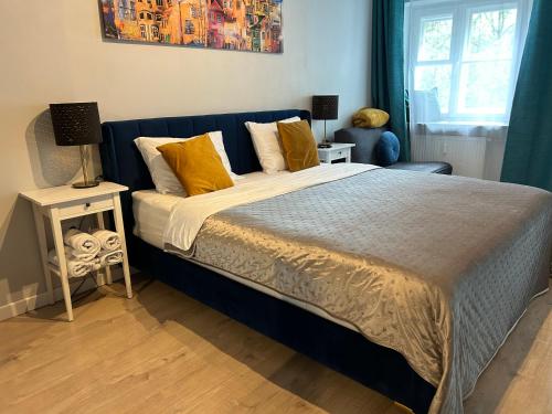 Posteľ alebo postele v izbe v ubytovaní La Mia Casa STARE MIASTO Warszawa