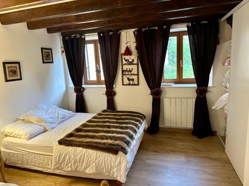 Posteľ alebo postele v izbe v ubytovaní Maison au coeur des Angles