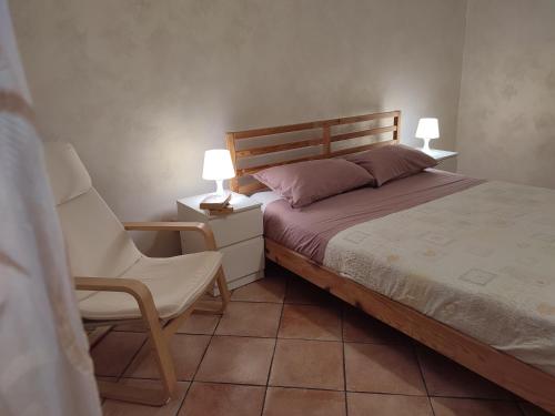 A bed or beds in a room at Appartamento Aci Sant'Antonio