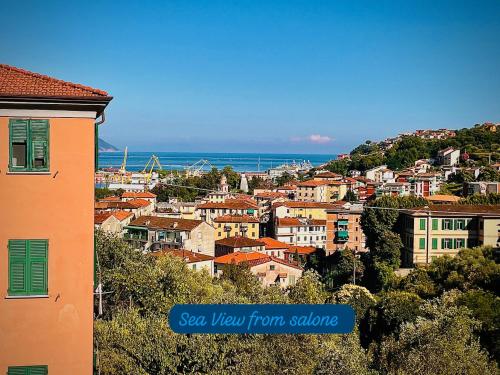a view of a city with houses and the ocean at Casa Olive 53 Mare in La Spezia
