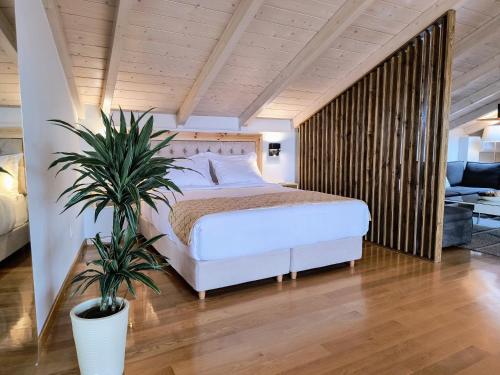 Ένα ή περισσότερα κρεβάτια σε δωμάτιο στο La Loft Luxury Appartment