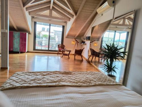 Ένα ή περισσότερα κρεβάτια σε δωμάτιο στο La Loft Luxury Appartment