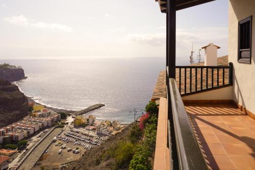 a balcony with a view of the ocean at Villa Altos de Santiago in Playa de Santiago