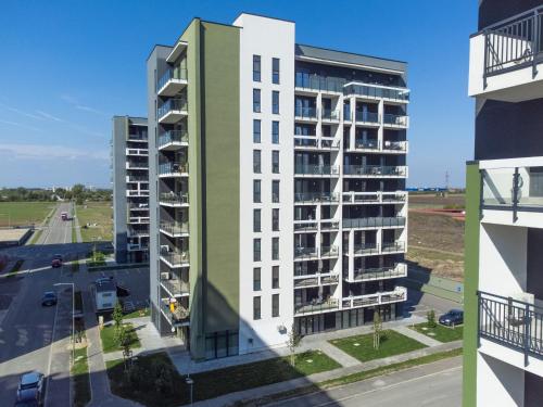an aerial view of a tall apartment building at ATENEO - Studio DeLuxe MODERN Apartment, BIG Balcony, Plus FREE Parking in Timişoara