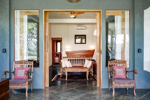 Кровать или кровати в номере Villa Kanari Batukaras