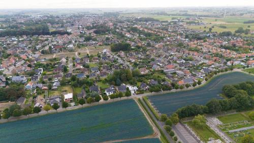 an aerial view of a town with a river and houses at Ruime en Zonnige 5 sterren Vakantiewoning SVN7tien in Doornhoek