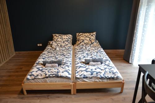 Postel nebo postele na pokoji v ubytování Hotel Mergera