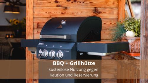 a kictureburning oven sitting on top of a counter at Chalet WaldHäusl luxuriöse Ferienwohnungen mit Sauna & Whirlpool, Kamin, Balkon oder Terrasse mit Bergblick in Heiligenblut