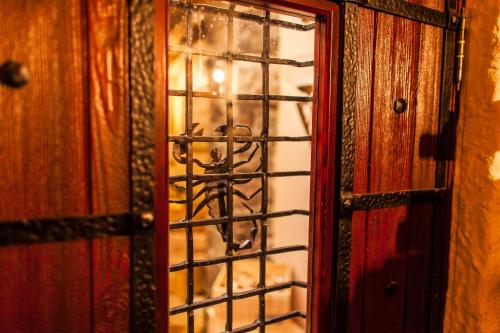 a glass door with a spider on it at TB Palace Hotel & SPA in Jūrmala