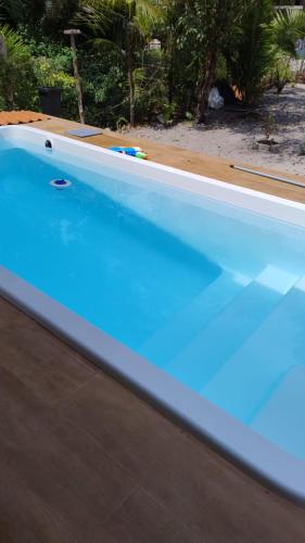 a close up of a swimming pool at Flat de Irinha Moreré in Cayru