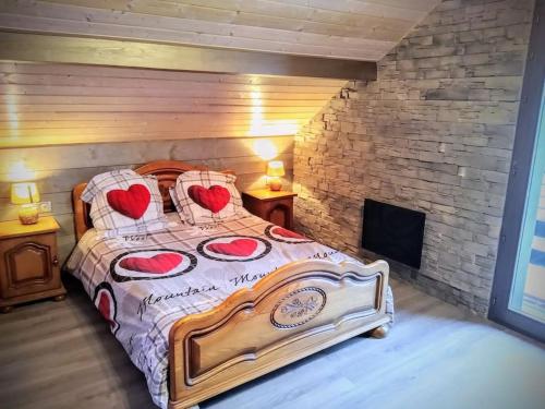 Ένα ή περισσότερα κρεβάτια σε δωμάτιο στο Superbe chalet Hautes Vosges