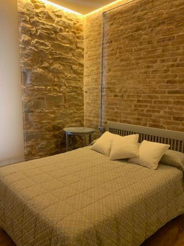 Ένα ή περισσότερα κρεβάτια σε δωμάτιο στο Casa del Párroco
