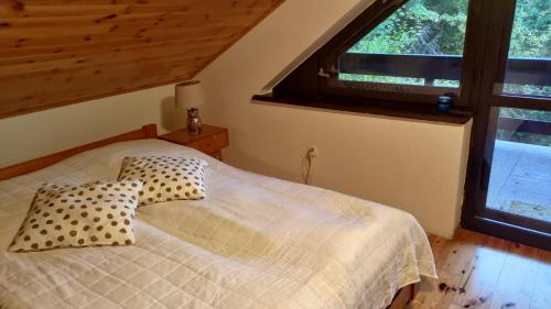 Postel nebo postele na pokoji v ubytování Kamińsko 544