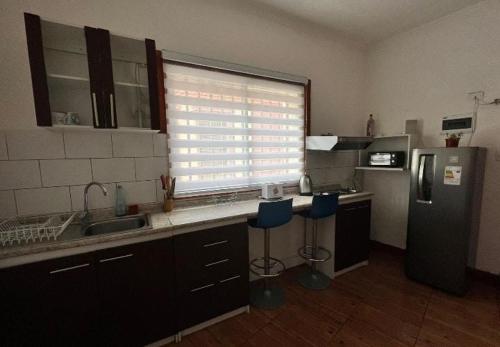 Η κουζίνα ή μικρή κουζίνα στο Entre cerros apartaments