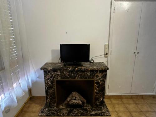 Μια τηλεόραση ή/και κέντρο ψυχαγωγίας στο departamento "lo de lily"