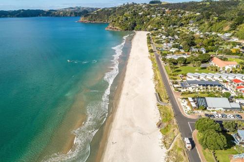 an aerial view of a beach and the ocean at Onetangi Beach Apartments in Onetangi