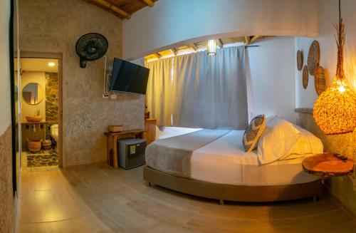 Postel nebo postele na pokoji v ubytování Hotel Campestre LA ALDEA