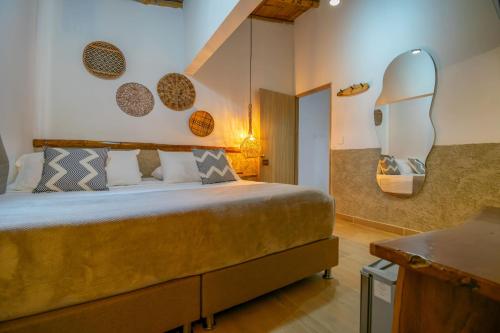 Postel nebo postele na pokoji v ubytování Hotel Campestre LA ALDEA