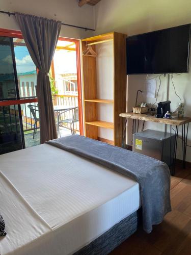 Postel nebo postele na pokoji v ubytování Hotel Campestre LA ALDEA