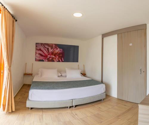 Postel nebo postele na pokoji v ubytování Hotel Campestre LA ALDEA
