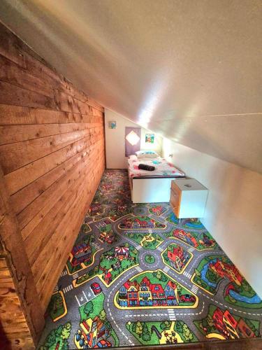 Cama o camas de una habitación en CASA UNO Heimeliges Chalet mitten in Spiez