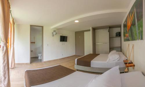 TV a/nebo společenská místnost v ubytování Hotel Campestre LA ALDEA