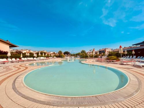 Πισίνα στο ή κοντά στο Platino Apt - Jacuzzi privata, Tre piscine, un Bar