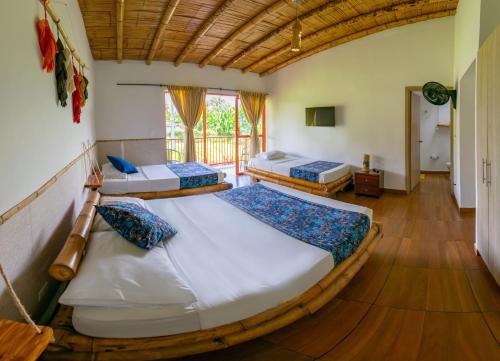 Katil atau katil-katil dalam bilik di Hotel Campestre LA ALDEA