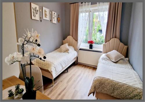 Ένα ή περισσότερα κρεβάτια σε δωμάτιο στο My Bed Bergedorf by Gugu