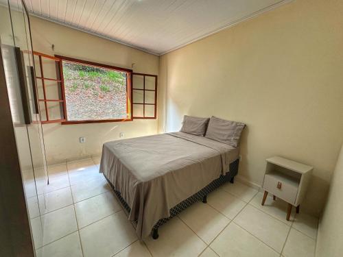 Katil atau katil-katil dalam bilik di parque cachoeira das andorinhas casa 2