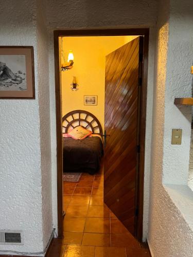Postel nebo postele na pokoji v ubytování Casa Naranja