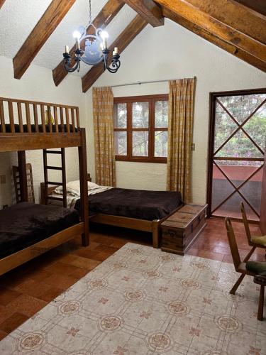 Postel nebo postele na pokoji v ubytování Casa Naranja