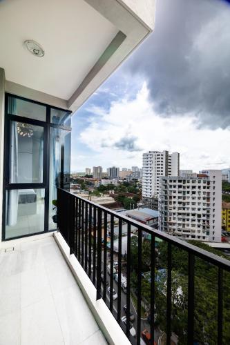 a balcony with a view of the city at #12Georgetown Luxury Suite with Rooftop Pool in George Town