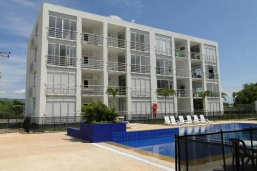 Bazén v ubytování Hermoso conjunto residencial con piscina nebo v jeho okolí