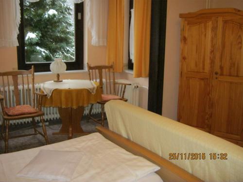 Voodi või voodid majutusasutuse Ferienhotel Waldfrieden toas