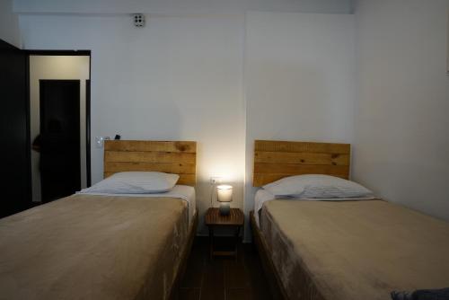 Una cama o camas en una habitación de Suites Apodaca