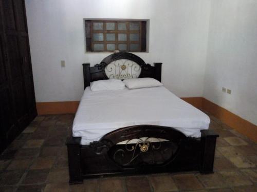 Postel nebo postele na pokoji v ubytování Ecohotel Otrolado Lodge