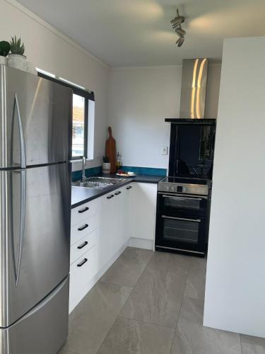 Dapur atau dapur kecil di Make memories at Cook Drive