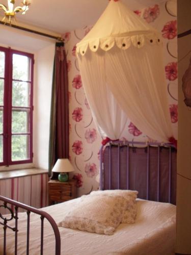 Posteľ alebo postele v izbe v ubytovaní Abbaye De Villelongue