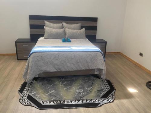 Кровать или кровати в номере holiday villa