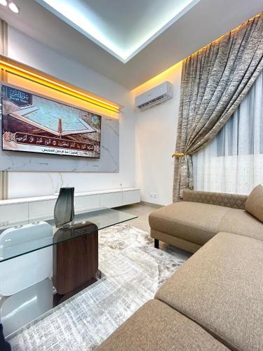 a living room with a couch and a tv at LUXURY PREMIUM #POINT e in Point E
