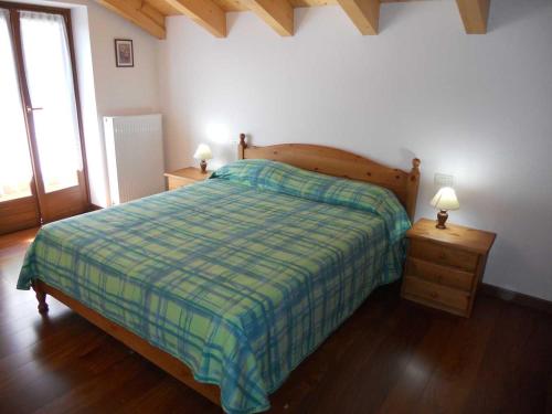 Ένα ή περισσότερα κρεβάτια σε δωμάτιο στο Casa Vacanze Villa Elena