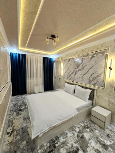 Postel nebo postele na pokoji v ubytování Apartment TASHKENT