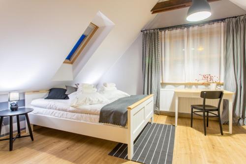 Posteľ alebo postele v izbe v ubytovaní Osada Cztery Pory Roku Czorsztyn