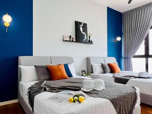 a room with a bed with fruit on it at 3BR-Sora-Paradigm Residence by Guesthouse-8-9Pax in Johor Bahru